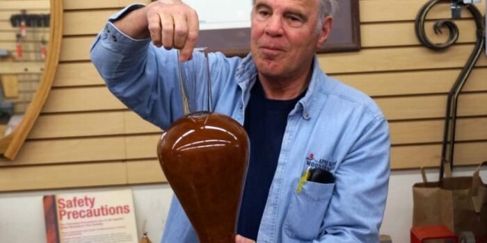 Tom B. with glass lined vase in Cherry